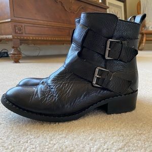Black leather zip boots